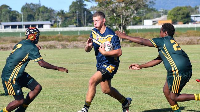 Shaun Devietti charges up the field against Abergowrie. Photos from the Will Murdoch Shield mini rugby league tournament involving the three Hinchinbrook high schools, Ingham State High School, Gilroy Santa Maria College and St Teresa's Catholic College Abergowrie, at Gilroy on Wednesday. Picture: Cameron Bates