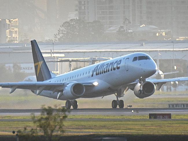 29/10/2020 : The first Alliance Aviation Embraer 190, lands at Brisbane airport, before taxiing away for a deep clean. A new addition to their fleet, an Embraer 190 comes at a time when most airlines are sending their aircraft to plane graveyards and storage sites, . It's the first of 14 100-seat jets to join the Brisbane-based operation which previously, and proudly operated an "all Fokker fleet". . Pic Lyndon Mechielsen