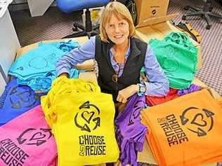 Lismore City Council's Waste Education Officer Barbara Jensen with some of the colourful new reusable bags Council will be distributing during Plastic Free July that feature designs by local artists.