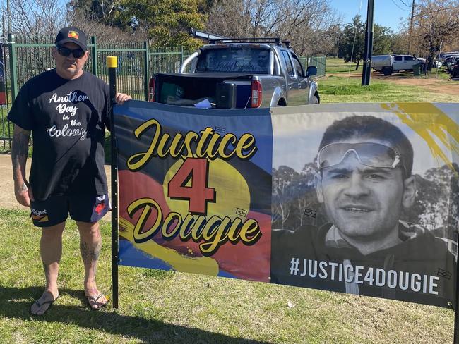 Ricky Hampson raising awareness in front of Dubbo Base Hospital two years after his son died after a misdiagnosis. Photo: Tijana Birdjan