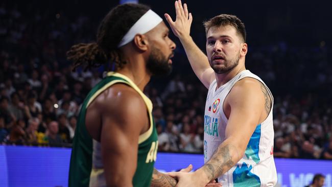 Luka Doncic shakes hands with Patty Mills. Picture: Getty Images