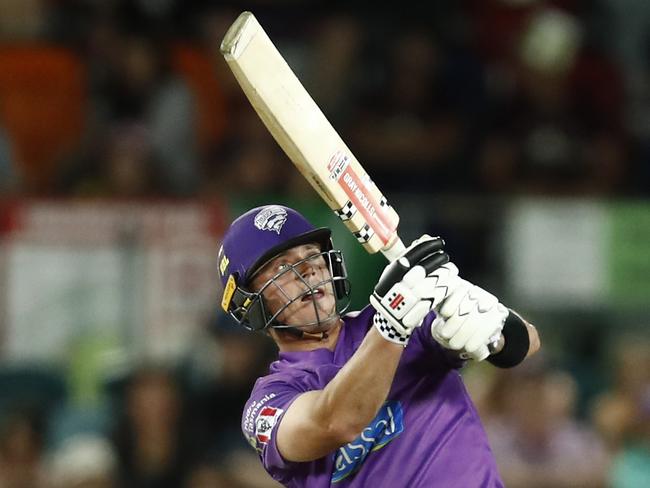 CANBERRA, AUSTRALIA - JANUARY 18: Ben McDermott of the Hobart Hurricanes hits a six during the Big Bash League match between the Sydney Thunder and the Hobart Hurricanes at Manuka Oval, on January 18, 2021, in Canberra, Australia. (Photo by Darrian Traynor/Getty Images)