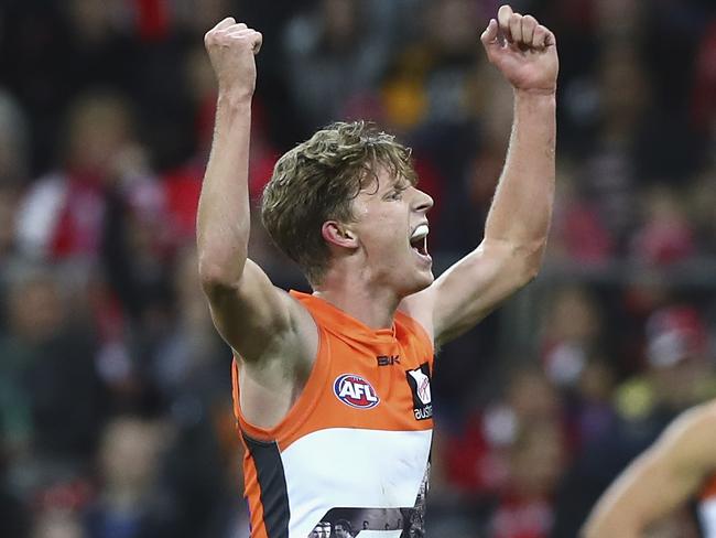 SYDNEY, AUSTRALIA - JUNE 12: Lachie Whitfield of the Giants celebrates a goal during the round 12 AFL match between the Greater Western Sydney Giants and the Sydney Swans at Spotless Stadium on June 12, 2016 in Sydney, Australia. (Photo by Ryan Pierse/Getty Images)