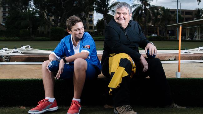 Scott Hocking, pictured right, with his 12-year-old son Cooper, who he had overlooked in picking during the inaugural SA lawn bowls Super League draft. Picture: AAP/Morgan Sette