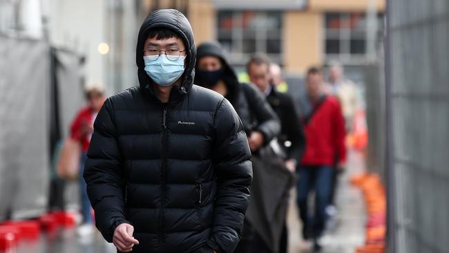 New restrictions have been in place in New Zealand since midday Wednesday, with Kiwis urged to wear masks in public. Picture: Fiona Goodall/Getty Images