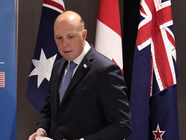 Federal Minister for Home Affairs Peter Dutton is seen prior to the 2018 Five Country Ministerial meeting on the Gold Coast, Tuesday, August 28, 2018. Australia is hosting the meeting that brings together the Interior Homeland Security, Public Safety and Immigration Ministers of Australia, Canada, New Zealand, United Kingdom and the United States. (AAP Image/Dave Hunt) NO ARCHIVING