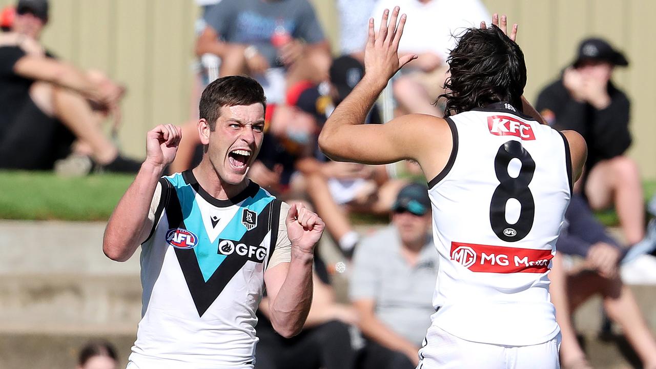 Zak Butters (left) joined fresh draftee Josh Sinn in re-signing at Port Adelaide for multiple years. Picture: Getty Images