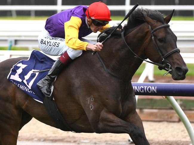 Jockey Regan Bayliss rides Paradee to victory in race 4, the Corporate Family Days At Flemington, during Twilight Races at Flemington Racecourse in Melbourne, Wednesday, March 4, 2020. (AAP Image/Vince Caligiuri) NO ARCHIVING, EDITORIAL USE ONLY