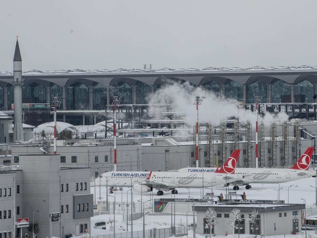 Parked planes on the snow-covered tarmac in Istanbul. Picture: Burak Kara/Getty Images