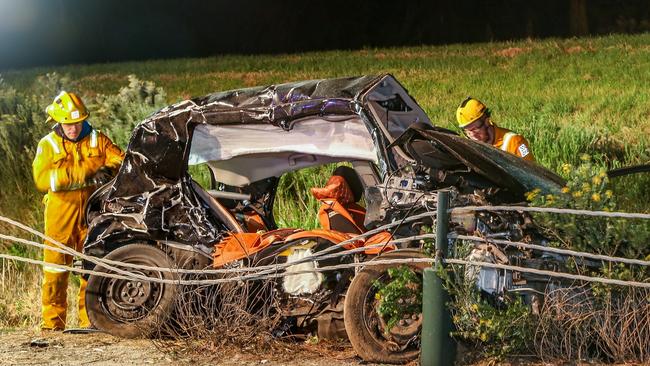 SES inspect the wreckage of Xinyu Yuan and her mother Mei-Li’s car. Picture: Gary Sissons.