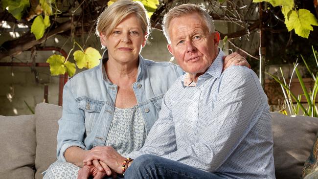 Allan Stoneham and his wife Julie at their home in Essendon. Alan is a former Essendon and Bulldog player who has been hit by concussion-related injuries. Picture: David Geraghty