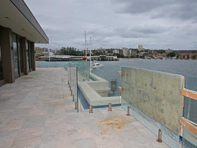 The run-down balcony looks towards Manly Cove and Sydney Heads. Picture: Troy Snook