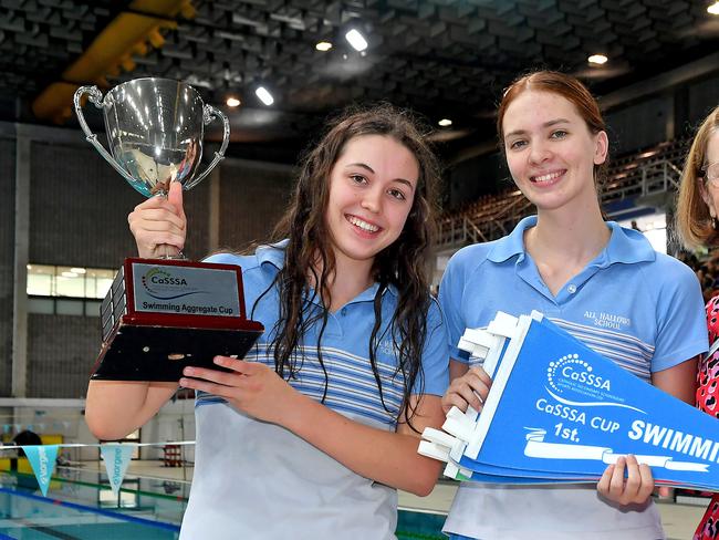 Winning team Dana Gronbach, Josephine Crimmins and All Halloes' school principal Catherine O'Kane.Action from the CASSSA swimming championships. Thursday March 10, 2022. Picture, John Gass