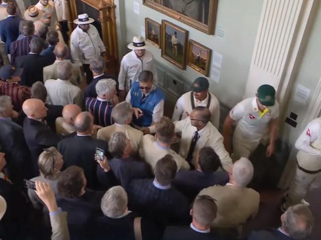 Australian players are heckled as they walk past MCC members at Lords after the dismissal of English batsman Jonny Bairstow. Picture: Nine Wide World of Sports