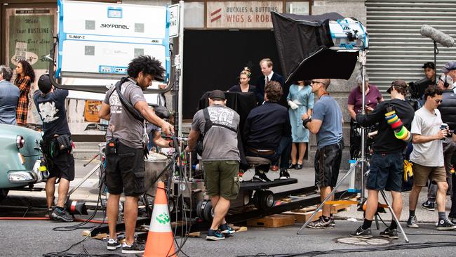 Crew prepare for a take on the set of the movie I Am Woman in Philip Street in Sydney on saturday. Pictures: Julian Andrews