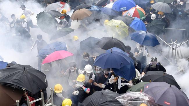 Protesters clash with riot police near Hong Kong's legislature building. Picture: Getty