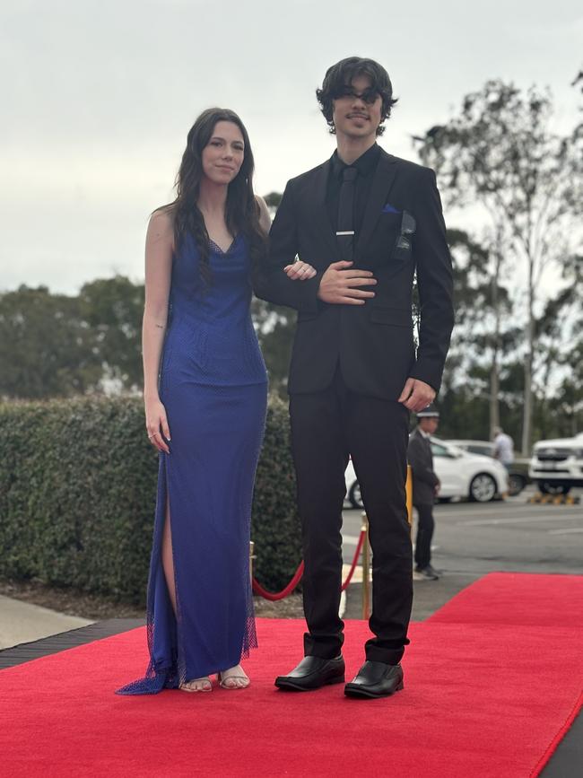 The students of Urangan State High School arriving at their formal.