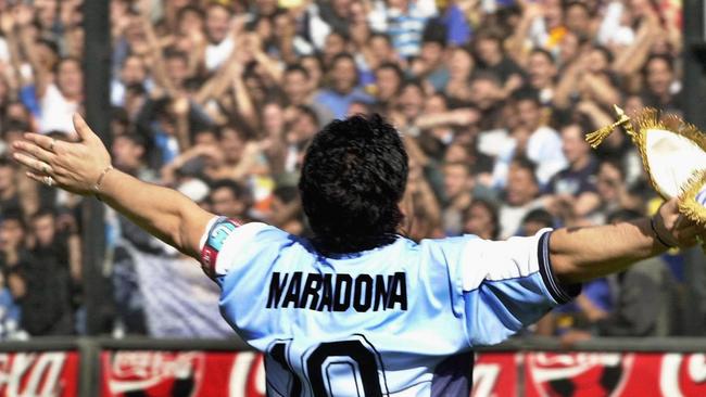 Diego Maradona greets the public in the 
