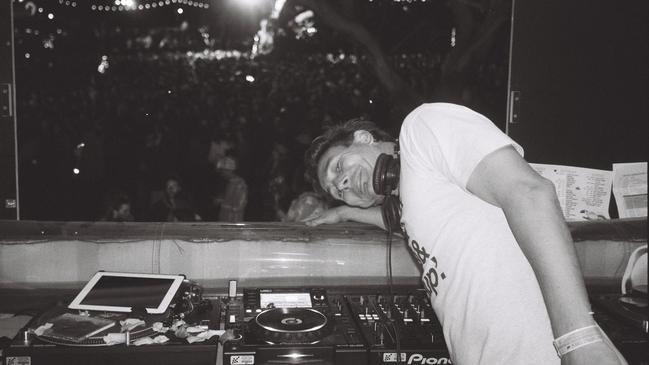 Level up. News Corp journalist Mikey Cahill (DJ Joey Lightbulb) DJing at Meredith Music Festival 2015. Picture: Daniel Cahill.