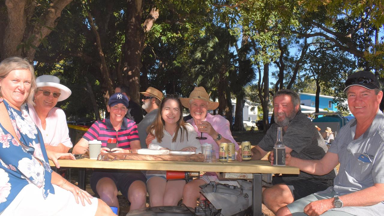 Enjoying the impresive motorised table are (from left) Leanne Patterson, Lurline Ford, Kim Lawler, Maggie Formosa, Merinda Andrew, Geoff Everett and the creator, Rick Patterson, also known as the 'Ideas Man' at Savour Seaforth 2021. Picture: Tara Miko