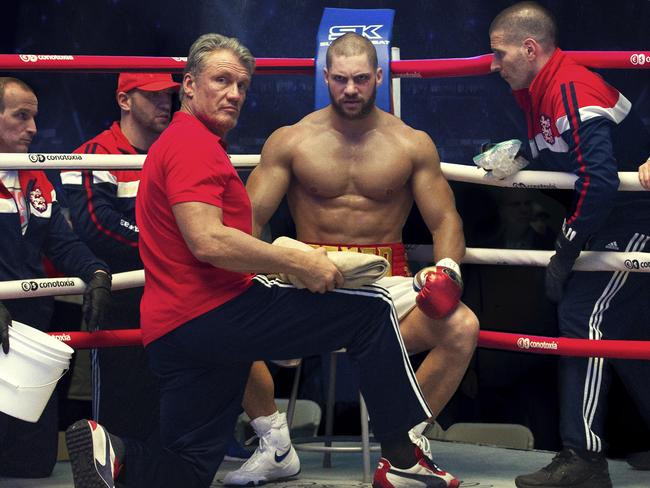 Dolph Lundgren, left as Ivan Drago, and Florian Munteanu as his son Viktor in a scene from Creed II.