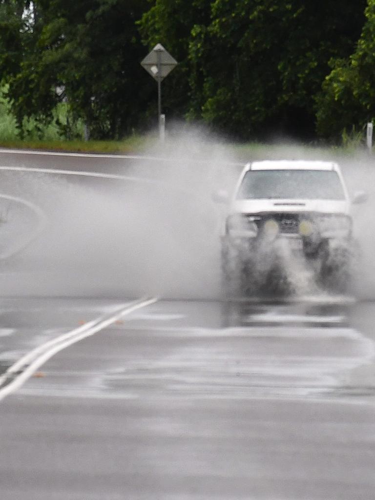 A vehicle navigates the notorious flood-prone Gairloch Washaway between Ingham and Cardwell. File photo. Picture: Cameron Bates