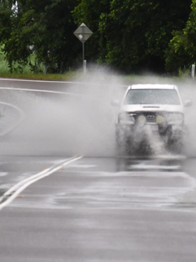 A vehicle navigates the notorious flood-prone Gairloch Washaway between Ingham and Cardwell. File photo. Picture: Cameron Bates