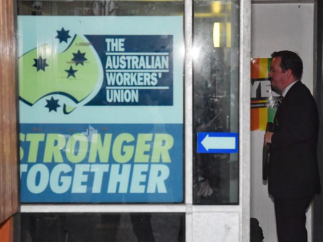 Federal police arrive at AWU offices in Spencer Street, Melbourne. Picture: Jason Edwards