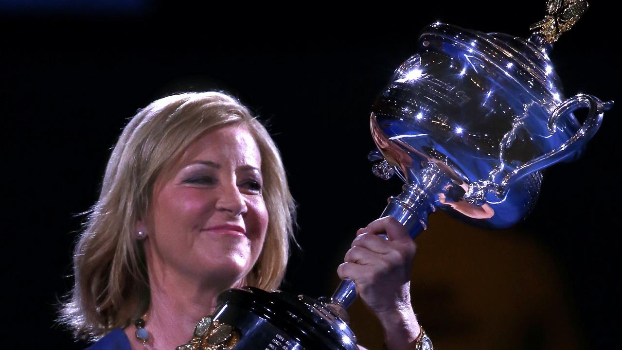 Chris Evert carries the Dapne Akhurst Memorial Cup onto Rod Laver Arena. Pic Michael Klein