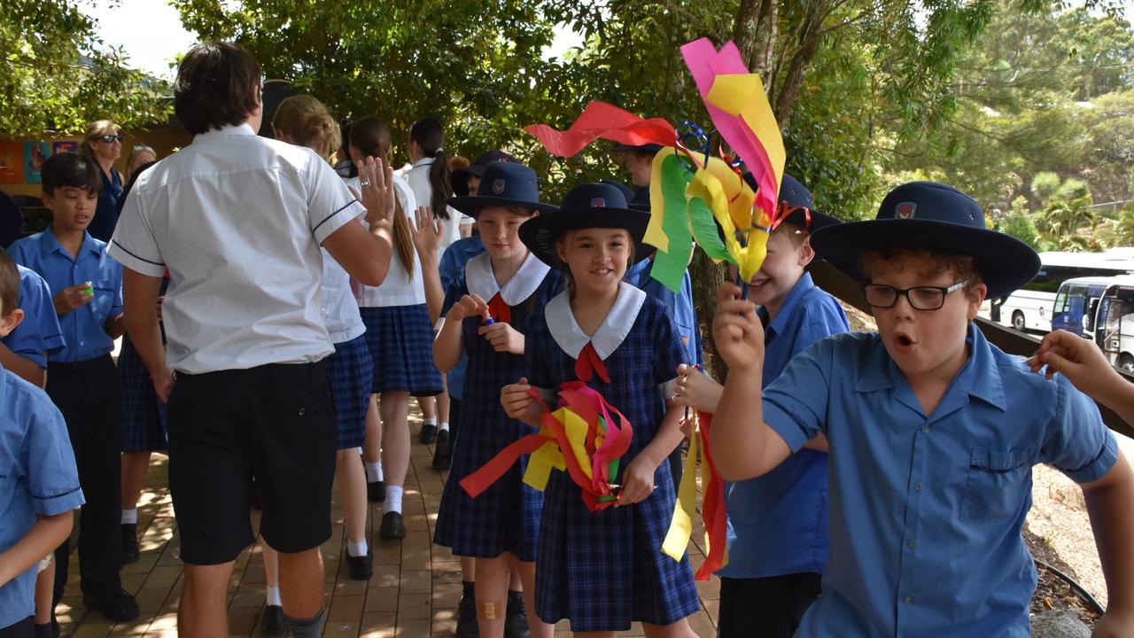 Suncoast Christian College farewells Year 12 students with a guard of honour across the campus.