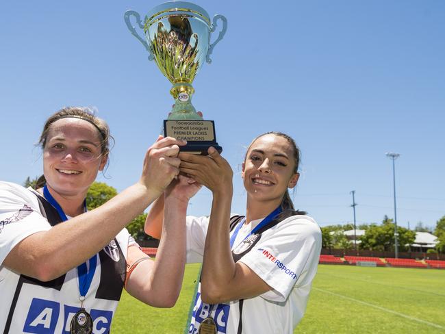 Willowburn captain Kiama Gray (left) and Hayley Gray lift the trophy after defeating Highfields in Toowoomba Football League Premier Women grand final at Clive Berghofer Stadium, Sunday, November 15, 2020. Picture: Kevin Farmer