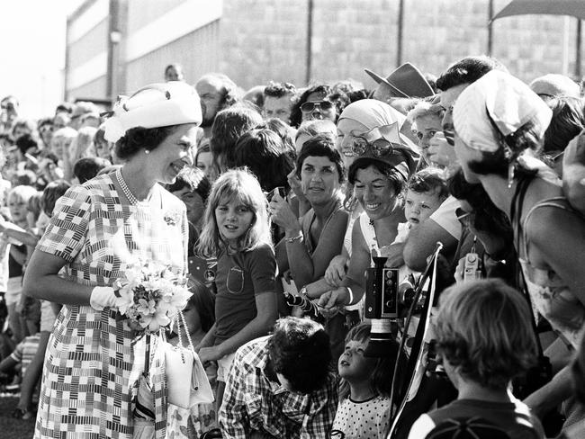 Territorians get their chance to be in proximity of Her Royal Majesty during her 1977 visit. Picture: NT News staff photographer.