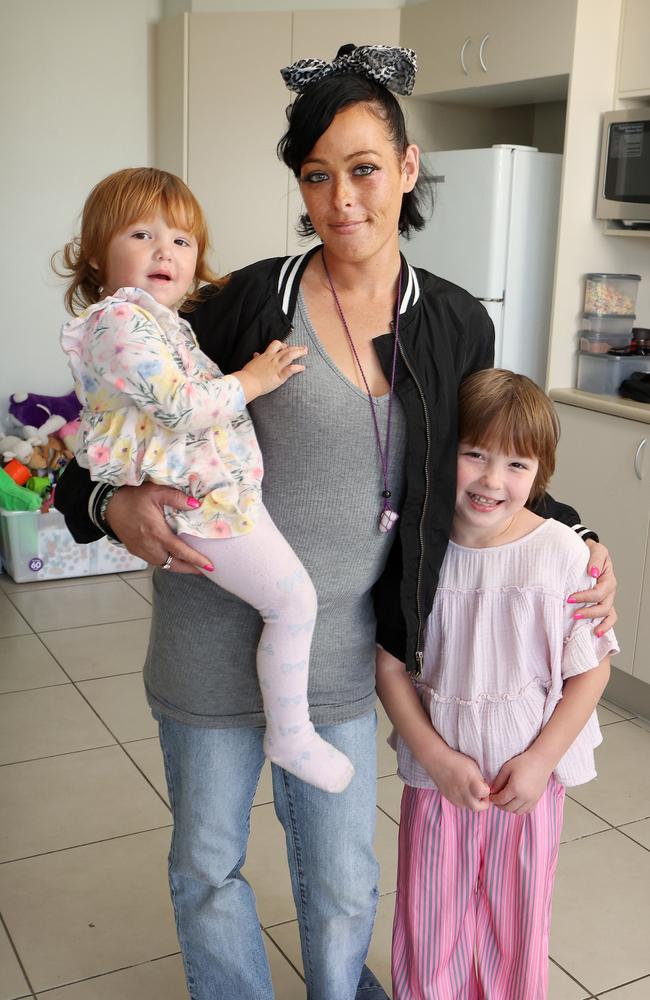 Single mum Skye Baird, 33, with her daughters Sophia, 7, and Shenayah, 2, at their rental home in Caboolture. Picture: Liam Kidston