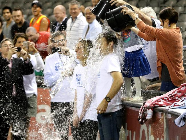 Angie and Pat Cunningham were the first to get drenched at the Ice Bucket Challenge world record attempt at Etihand Stadium in 2014. Picture: Tim Carrafa