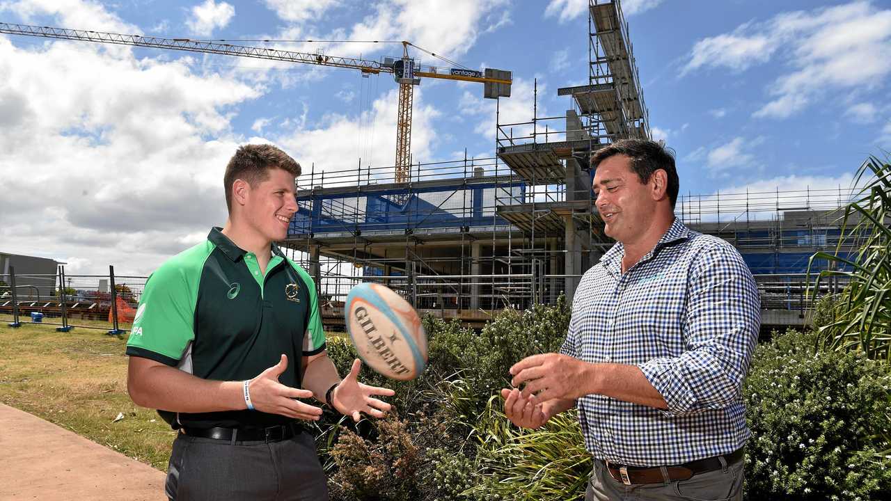 The construction of the Sports Hub at Kawana is well underway. Former Wallaby player Glenn Panoho (right) and Australian junior rugby union player Harry Vella outside the centre. Picture: Warren Lynam