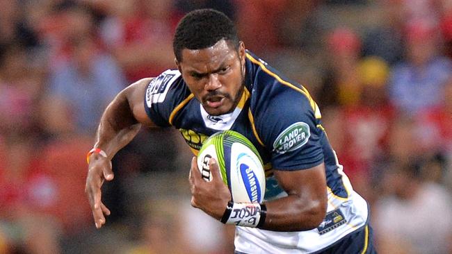 BRISBANE, AUSTRALIA - MARCH 14: Henry Speight of the Brumbies attempts to break away from the defence of Will Genia of the Reds during the round five Super Rugby match between the Reds and the Brumbies at Suncorp Stadium on March 14, 2015 in Brisbane, Australia. (Photo by Bradley Kanaris/Getty Images)