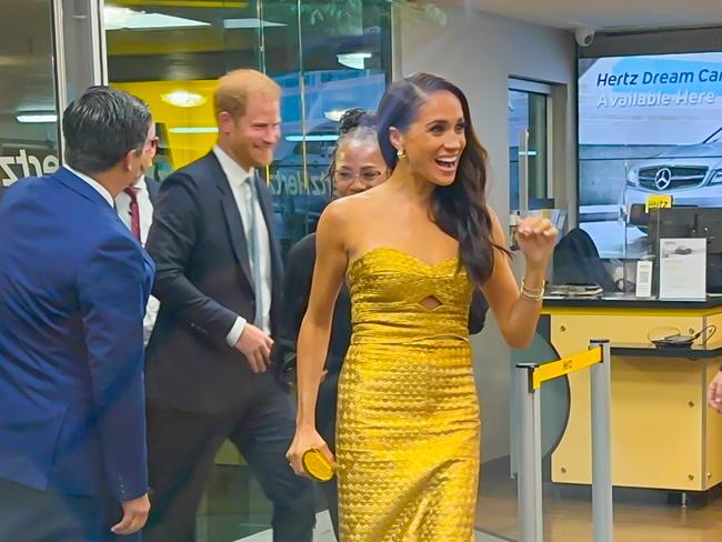 The royal couple and Doria Ragland leaving the event before the ‘chase’ began. Picture: Raymond Hall/GC Images