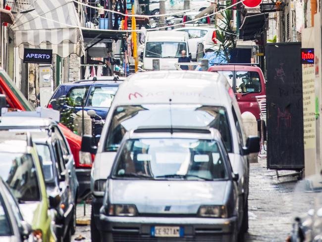 Naples, Italy. Traffic in a narrow street of Naples old town area.Escape 19 November 2023NewsPhoto - iStock