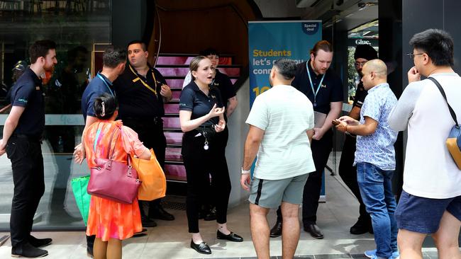 Customers seek help from an Optus store in the Brisbane CBD. Picture: David Clark