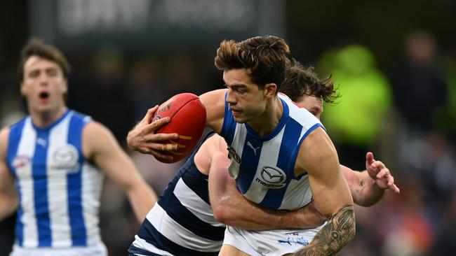 Jed Bews tackles Jy Simpkin in his return game. Picture: Steve Bell/Getty Images