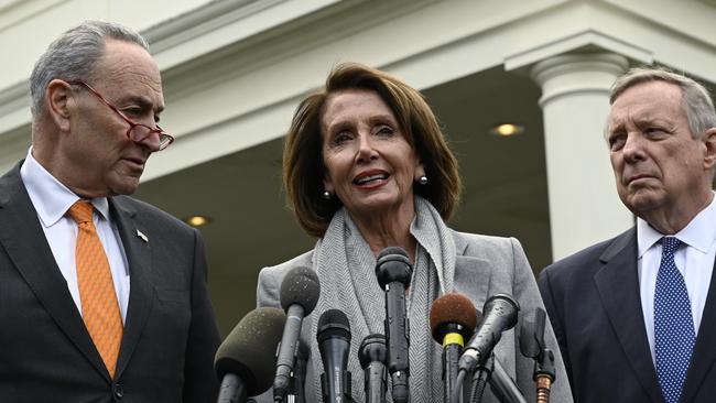 House Speaker Nancy Pelosi with Senate Minority Leader Chuck Schumer and Sen. Dick Durbin, speak with reporters following their meeting with Donald Trump. Picture: AP.