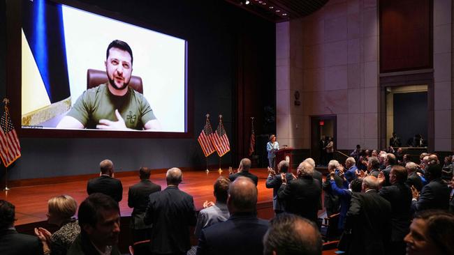 Volodymyr Zelensky receives a standing ovation from the members of congress on Capitol Hill in Washington on Wednesday. Picture: AFP