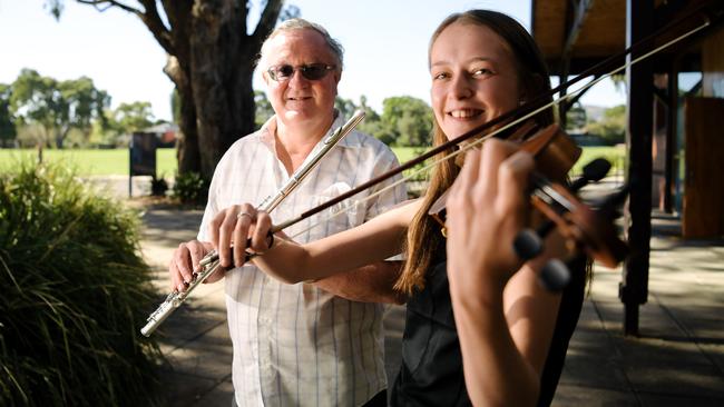 Robert Brown with violinist Daisy Elliot from Mitcham Orchestra. Picture: AAP / Morgan Sette