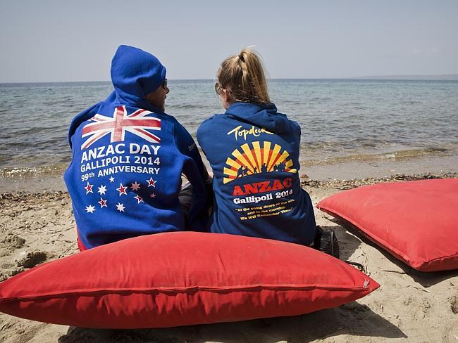 Taking it easy ... For the first time since Anzac celebrations started in Gallipoli a staging post with big red cushions on the beach has been organised for the backpackers in Mimoza junction in the Gallipoli peninsula. Pic: Ella Pellegrini