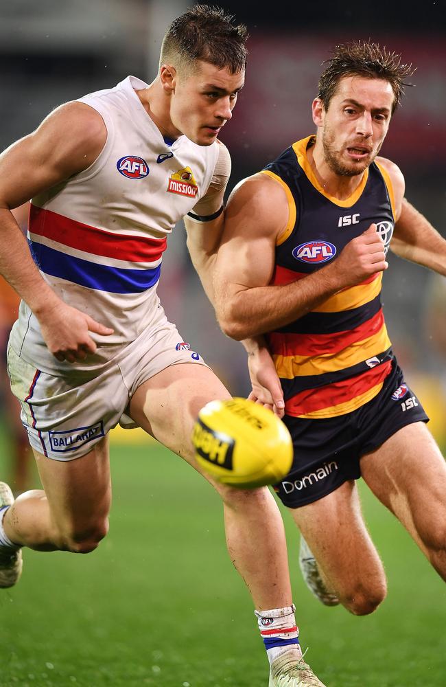 Matt Suckling of the Bulldogs competes with Richard Douglas of the Adelaide Crows in May. Picture: Mark Brake/Getty Images