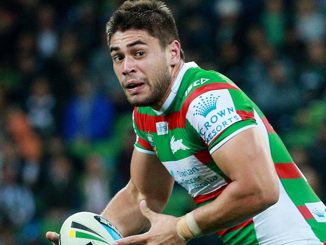 NRL Round 10 - Melbourne Storm v Sydney Rabbitohs at AAMI Park, Chris Grevsmuhl gets through a Will Chambers tackle. .16th May 2015. Picture: Colleen Petch.