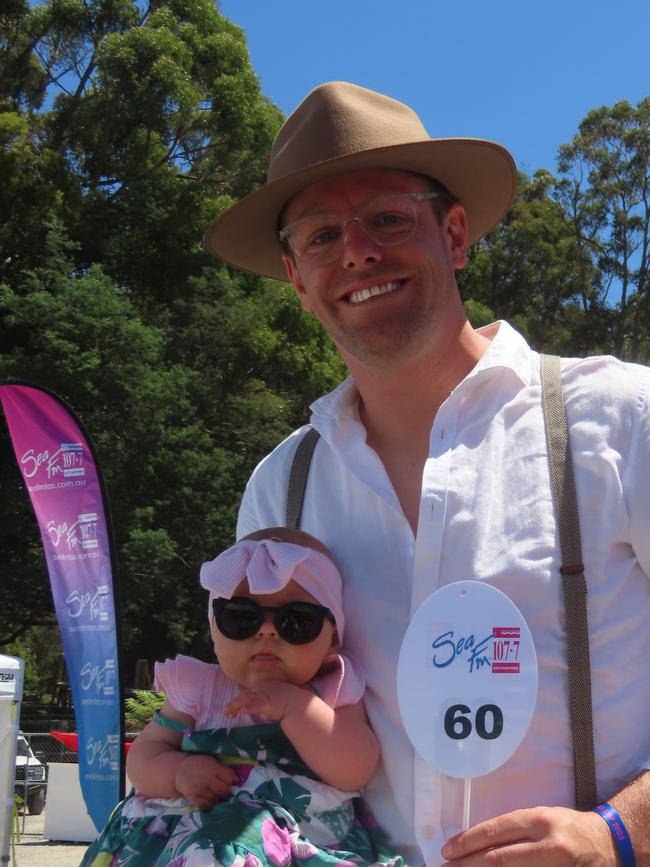 Fashions on the field couples highly commended winners Cameron Brooke and five month old daughter Cleo. Picture: Jon Tuxworth