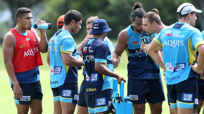 John Olive (left) during Gold Coast training.