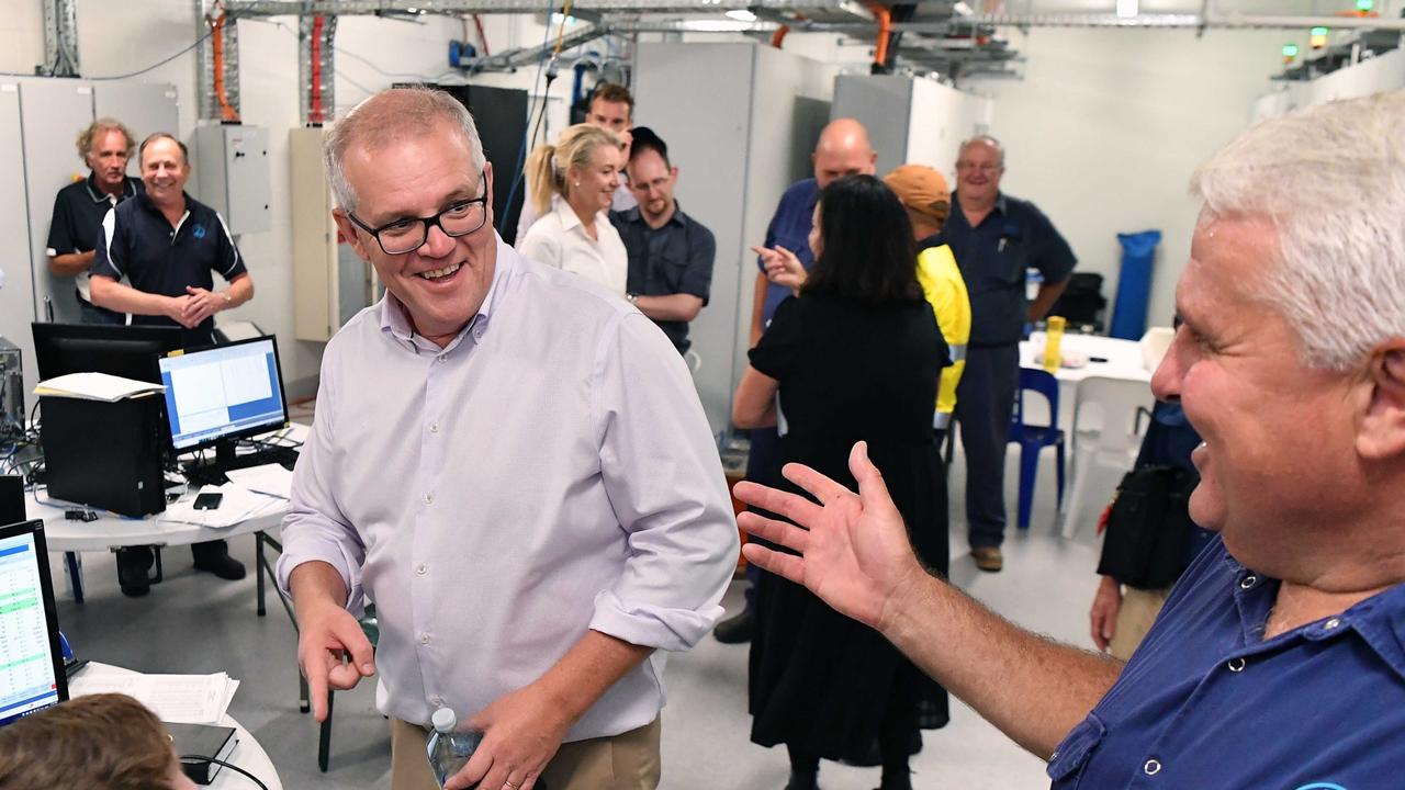 Prime Minster Scott Morrison visits Nolan Meats, Gympie, after devastating floods. Pictured with Terry Nolan. Photo: Patrick Woods.