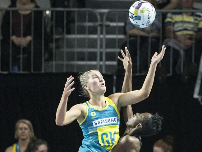 Courtney Bruce, poised to make her Diamonds debut, playing Fast5 netball against Jamaican Anna Kay Griffiths.